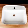 Camber rectangular above counter wash basin with taphole